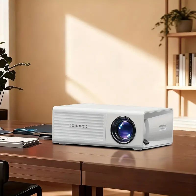 Mini Portable Projector for Home Entertainment, 600P Native Resolution, 1080P Supported, Compact Wall-Mounted & Mobile Phone Projector with Built-In Speaker